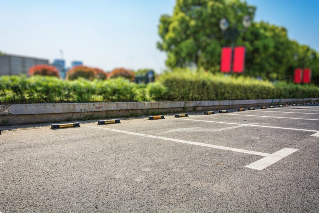 Enhancing Parking Lots: How Regular Sealcoating Boosts Appearance and Durability