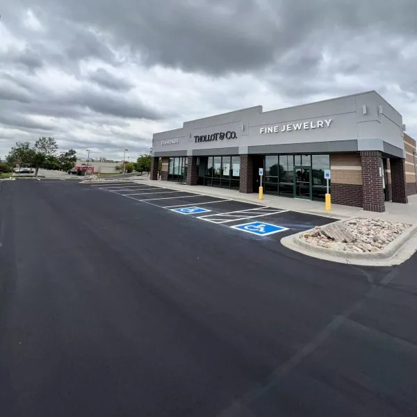 A Thollot & CO Project Recap: New asphalt parking lot, ADA spaces, and parking lot striping.