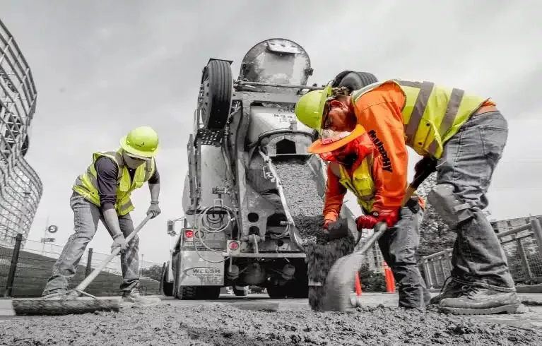Laying fresh concrete.