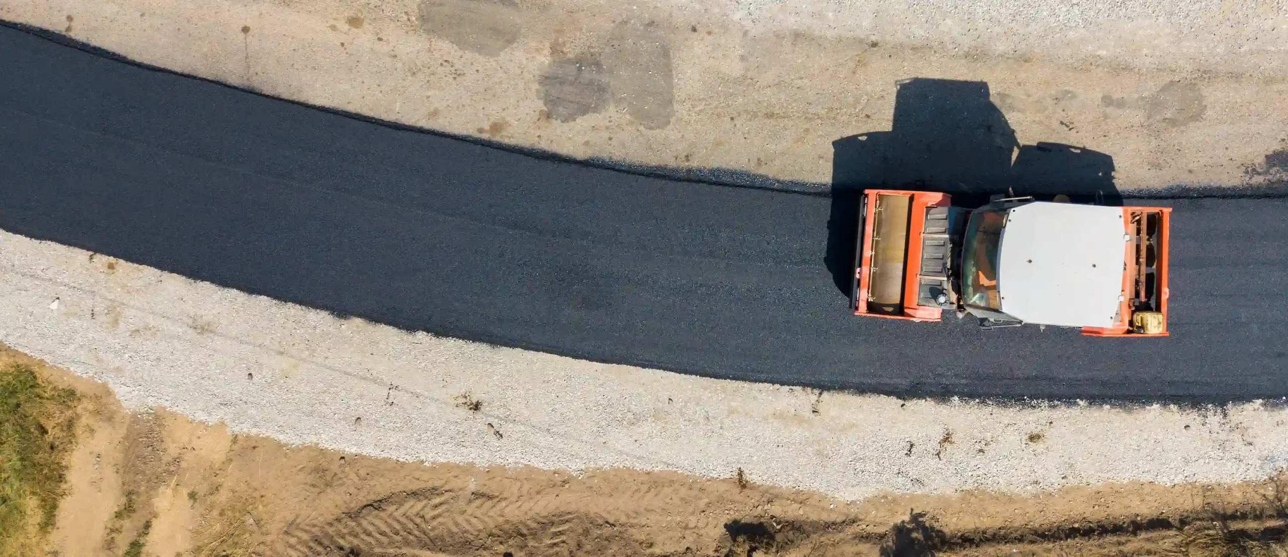 Read more about the article Asphalt vs. Concrete Parking Lots: Which Is Right for Your Commercial Property?