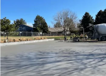 A new concrete parking lot being poured by National Pavement Partners