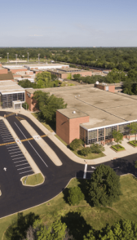 aerial view of a school and parking lot
