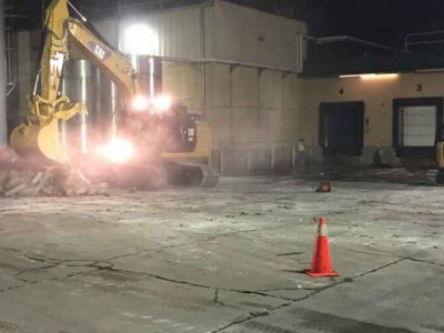 National Pavement Partners concrete: tearing up the old parking lot at night.