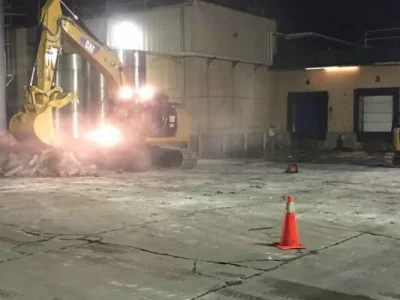 National Pavement Partners concrete: tearing up the old parking lot at night.